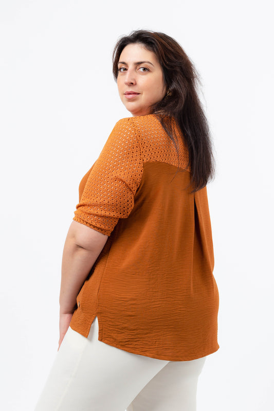 Plain blouse with lace detail