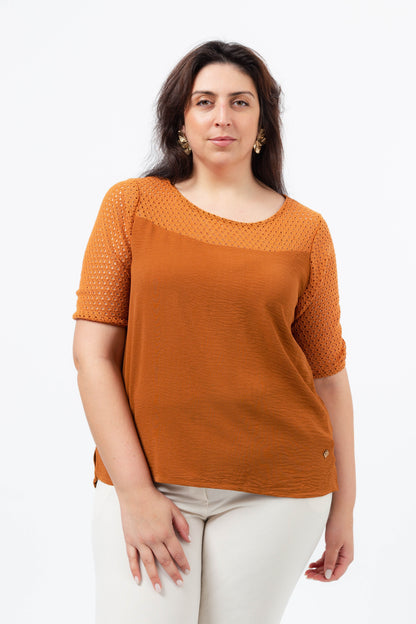 Plain blouse with lace detail